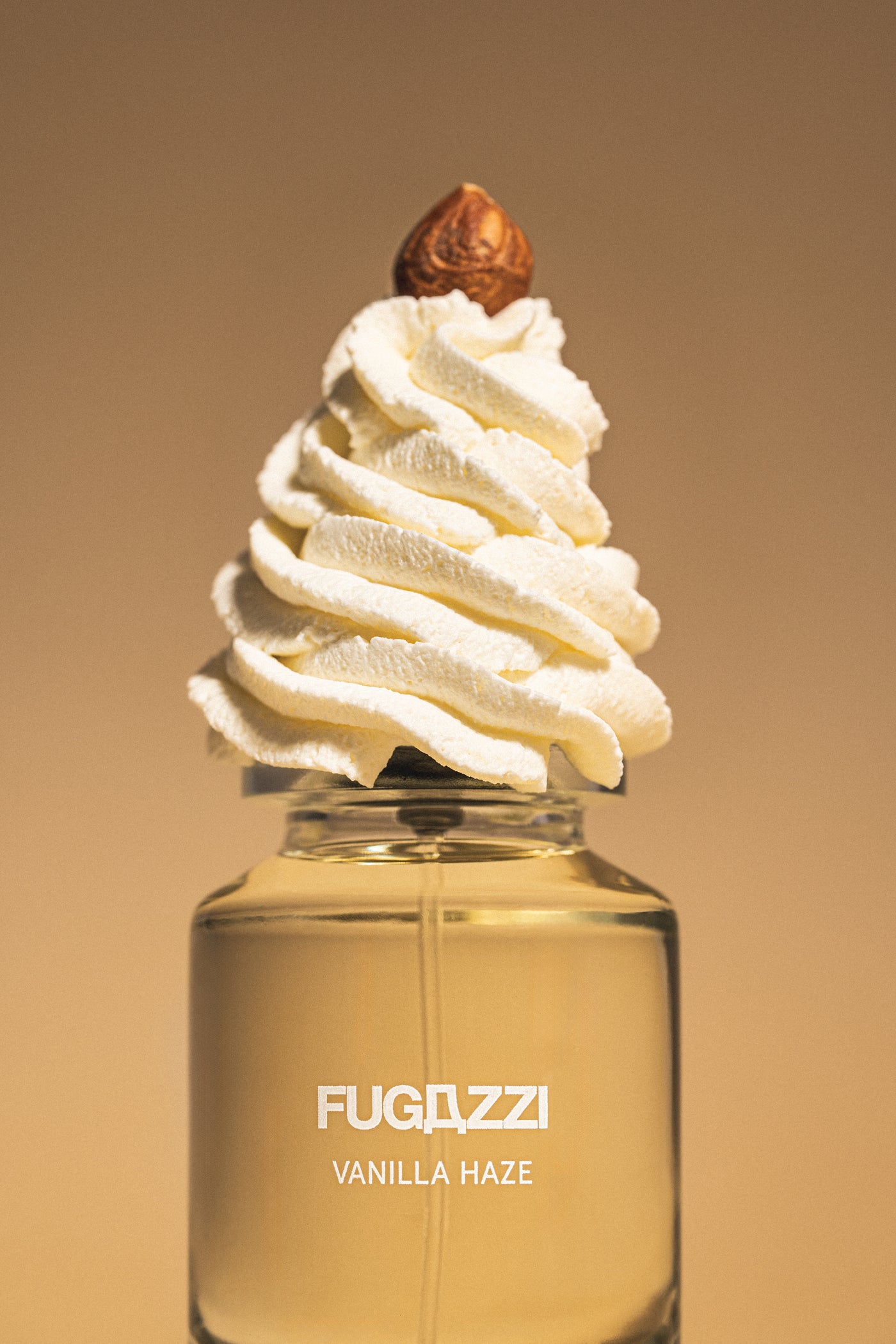 Vanilla Haze perfume bottle topped with sculpted cream